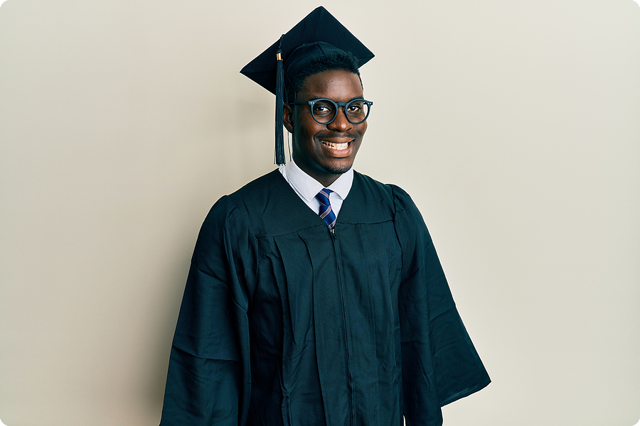 black-man-wearing-graduation-cap-and-gown Black Man Wearing Graduation Cap & Gown